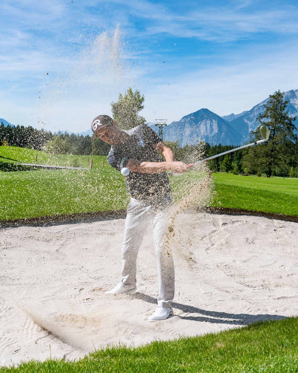 Golfschlag im Bunker